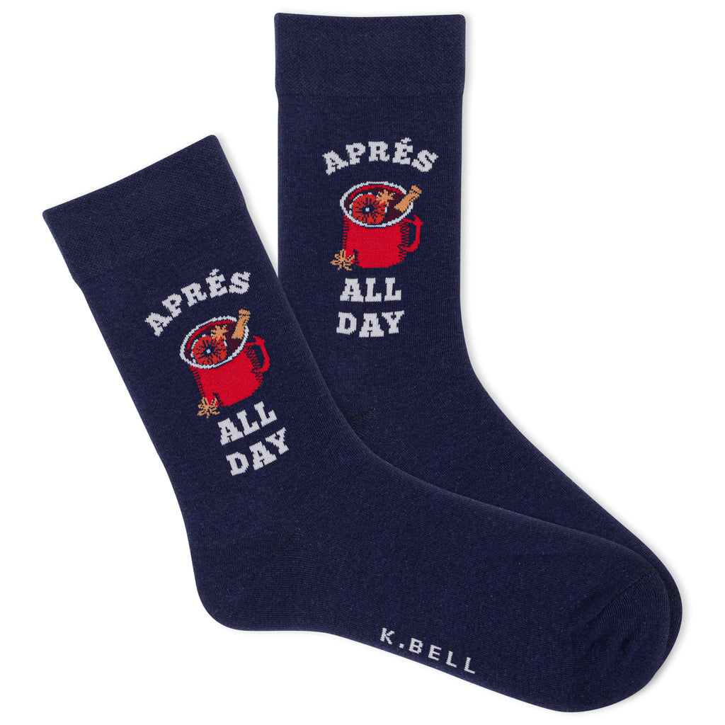 A pair of navy crew socks with a white and red graphic design featuring a hot toddy and the phrase 'aprés all day'