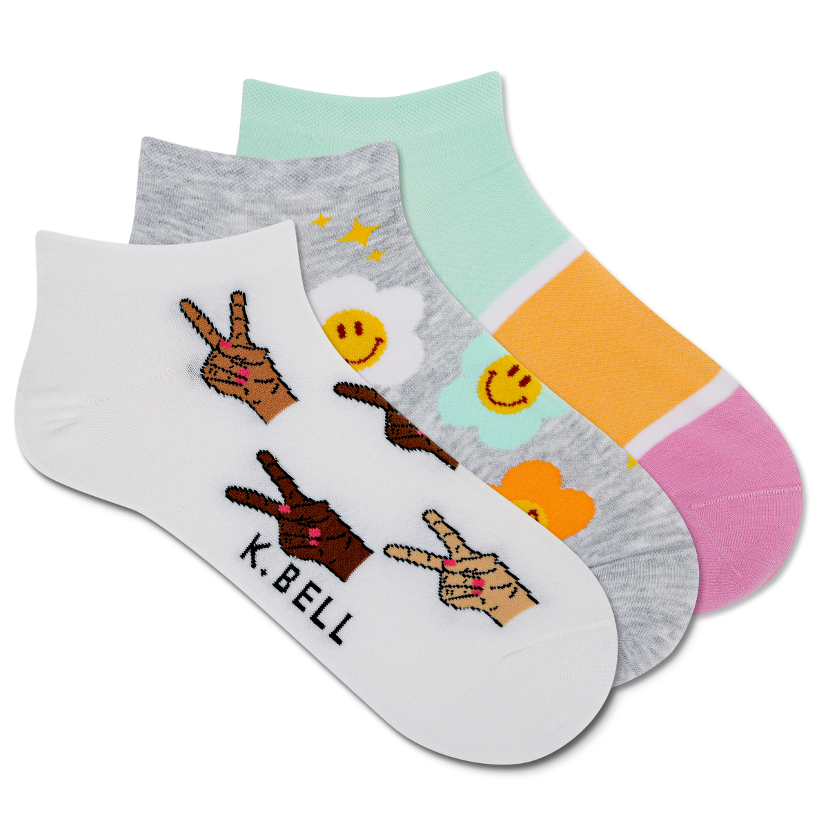 Three pairs of low cut socks with various colorful designs and text readings 'K.Bell'.
