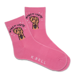 A pair of pink active crew socks with 'Women Unite' text and a fist graphic, and the brand name 'K.Bell' displayed at the bottom. thumbnail