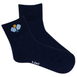 Pair of navy blue socks with a small design and 'k.bell' branding on a white background
