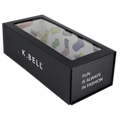Black K. Bell shoe box with colorful sock design inside on a white background