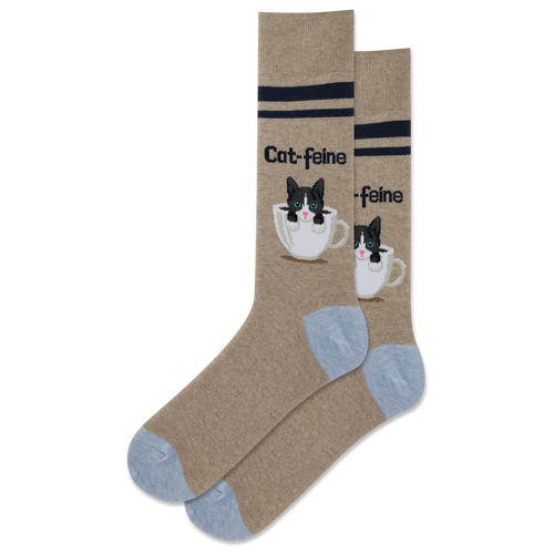 A pair of tan crew socks with a pattern of white cat faces and coffee cups, and black stripes.