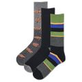Three pairs of men's crew socks in a pack, featuring different designs including a turtle pattern, stripes, and a plain black pair.