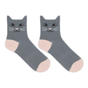A pair of black ankle socks with a cat face design and blue accents on the heels and toes.